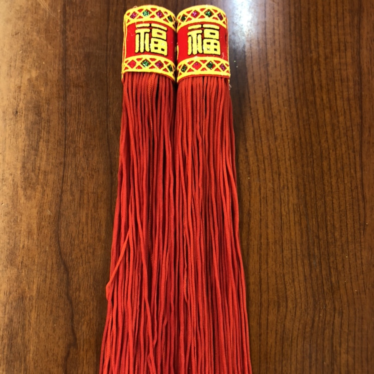 Four-part tube fabric tassels