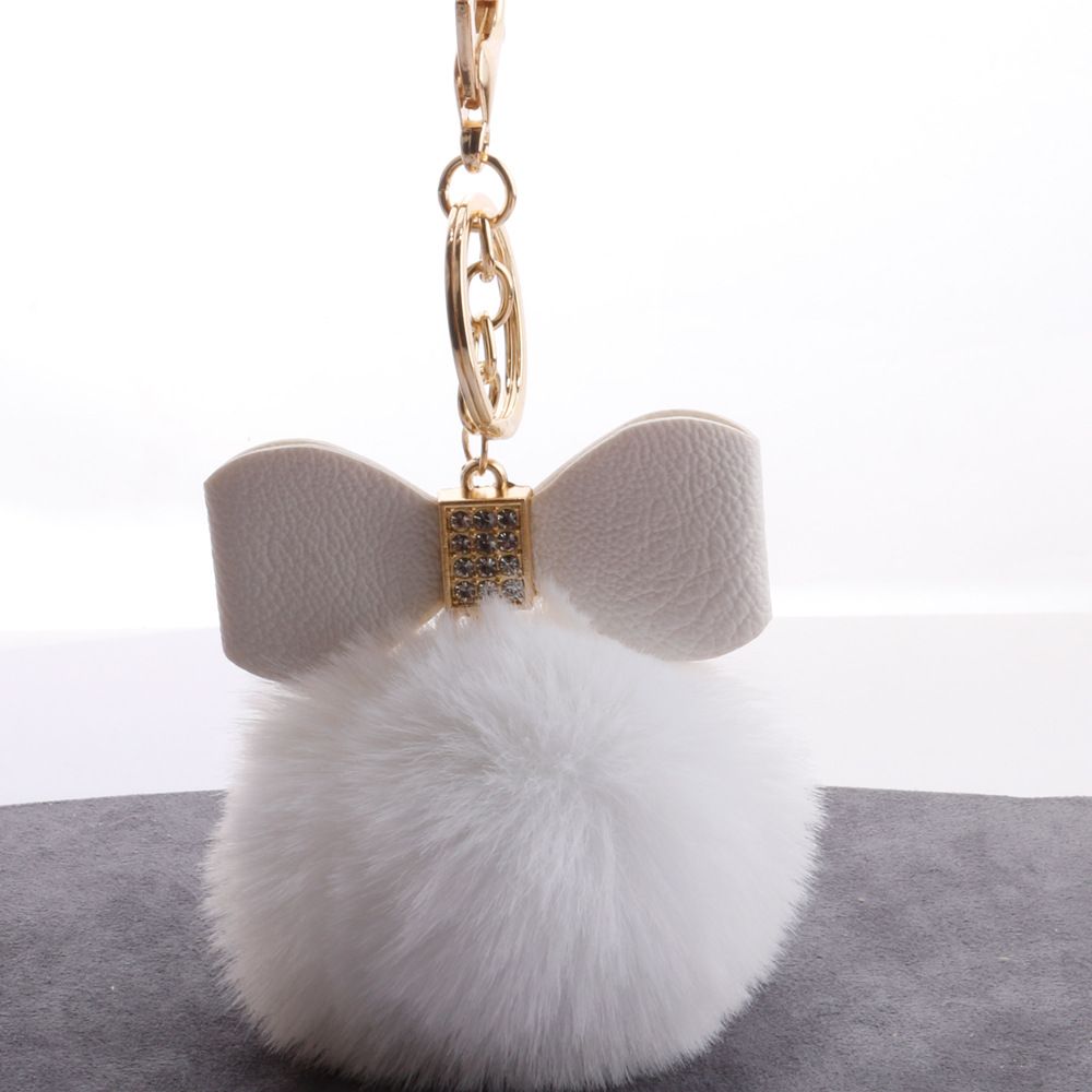 承接外贸订单蝴蝶结毛球挂件钥匙链可爱包包汽车仿獭兔钥匙扣挂件
