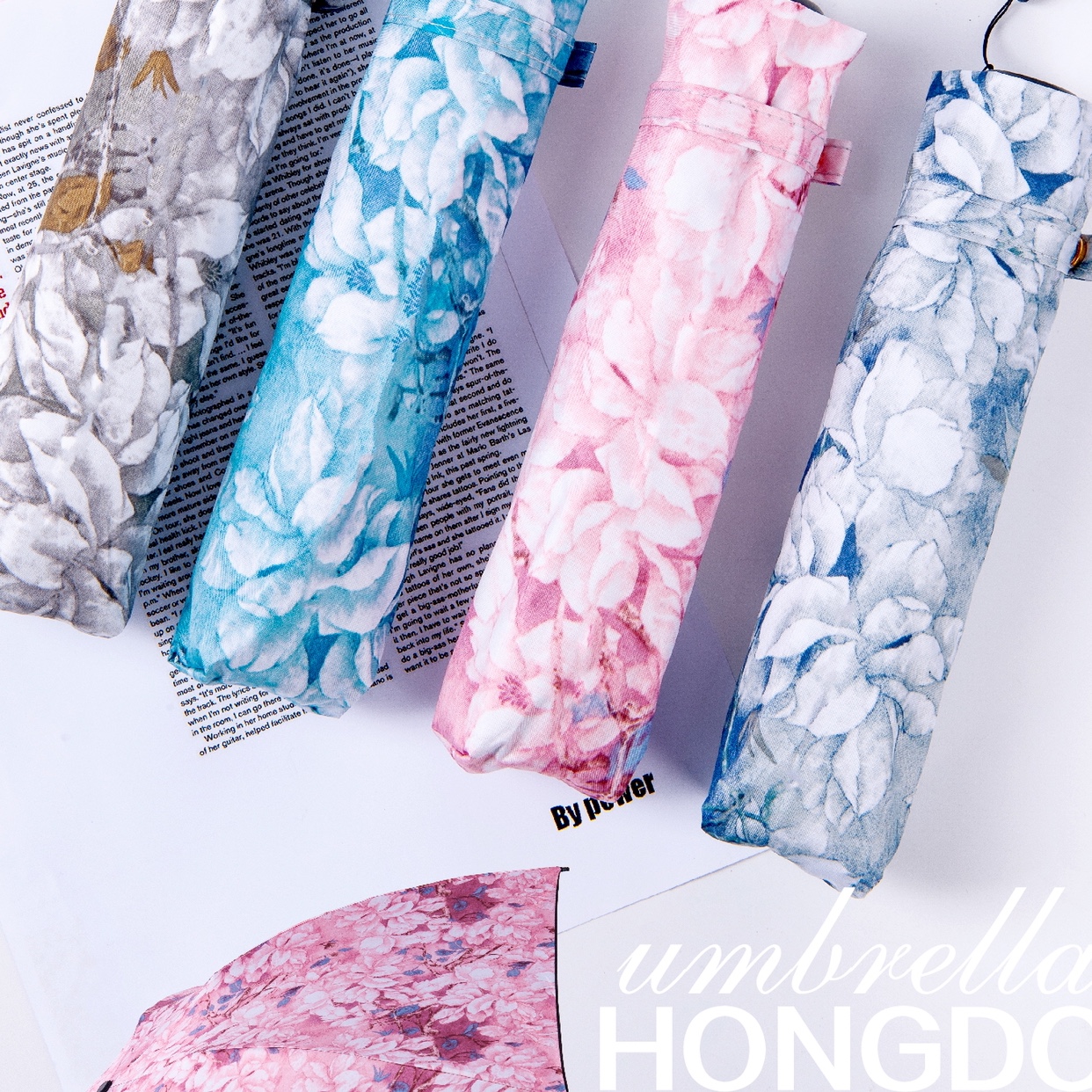 Two Pairs Of Umbrellas