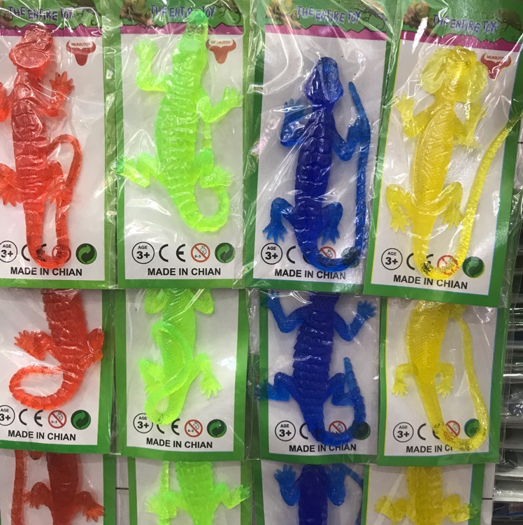Street stall supply of children's toys hanging CARDS retail for $1.12 soft lizard gecko thumbnail