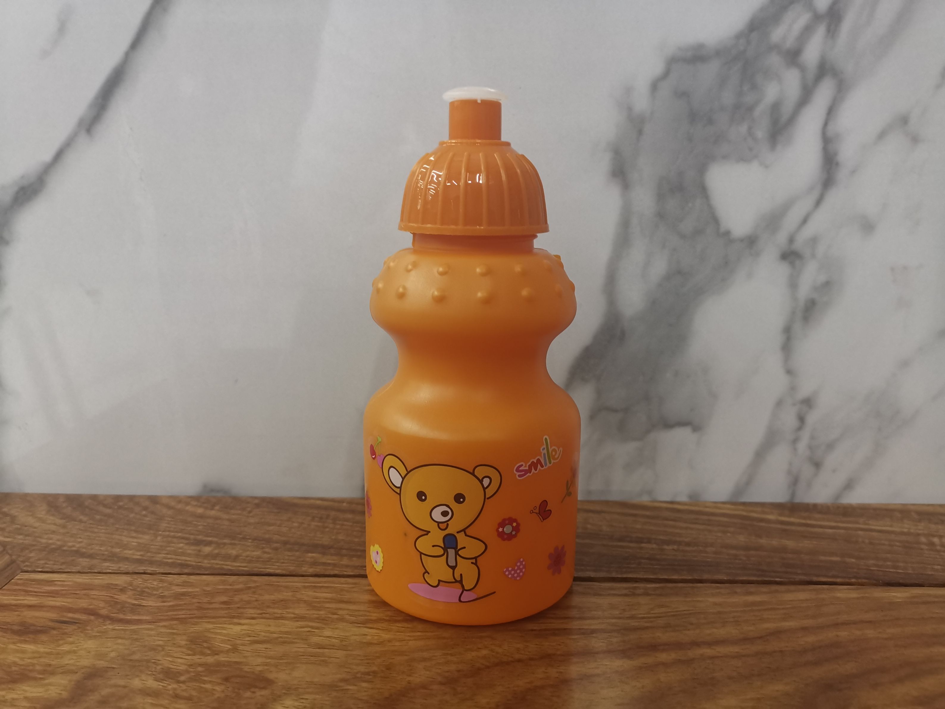 Foreign trade special children's water bottle plastic drinking bottle one open cover water bottle owner recommends children's orange kettle full figure