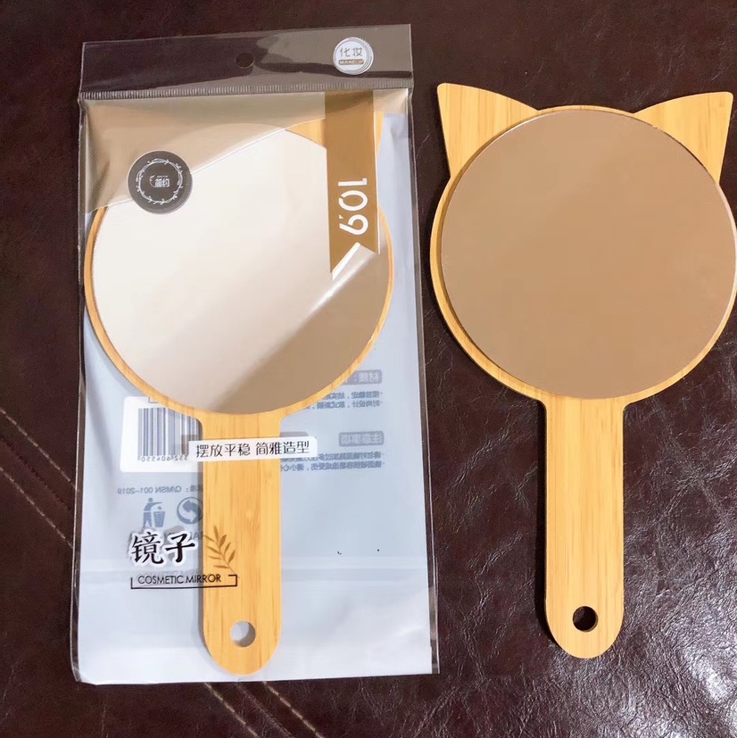 Thin wooden handle mirror cartoon thumbnail