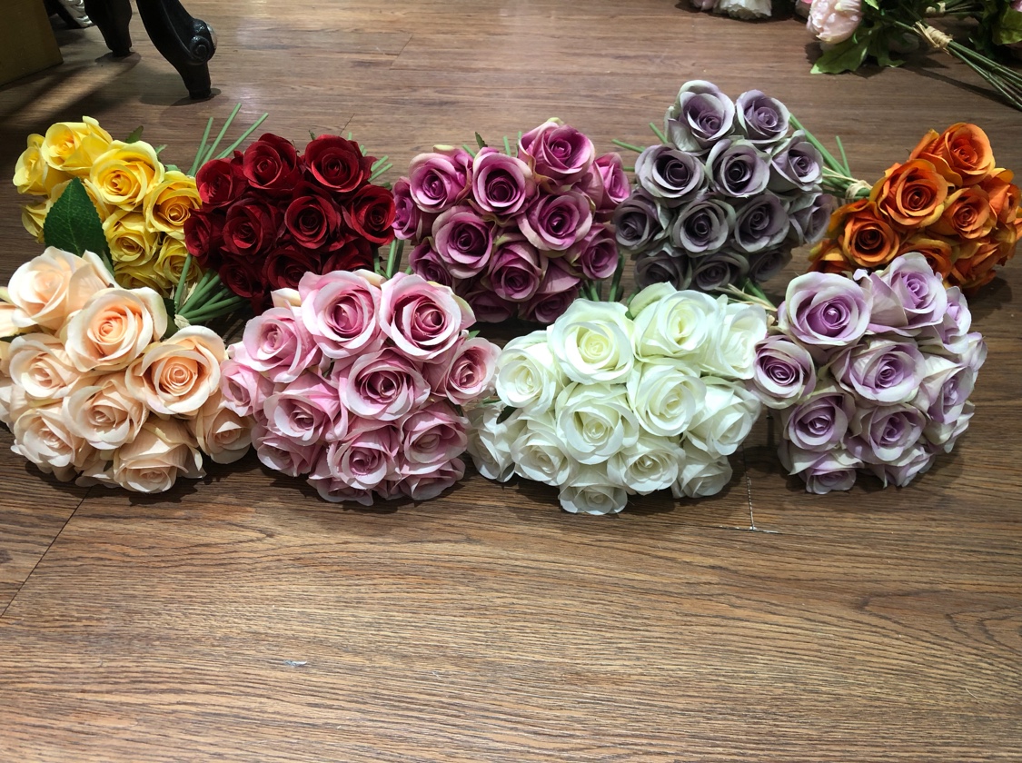 Tenedor de 12 cabezas pequeñas rosas