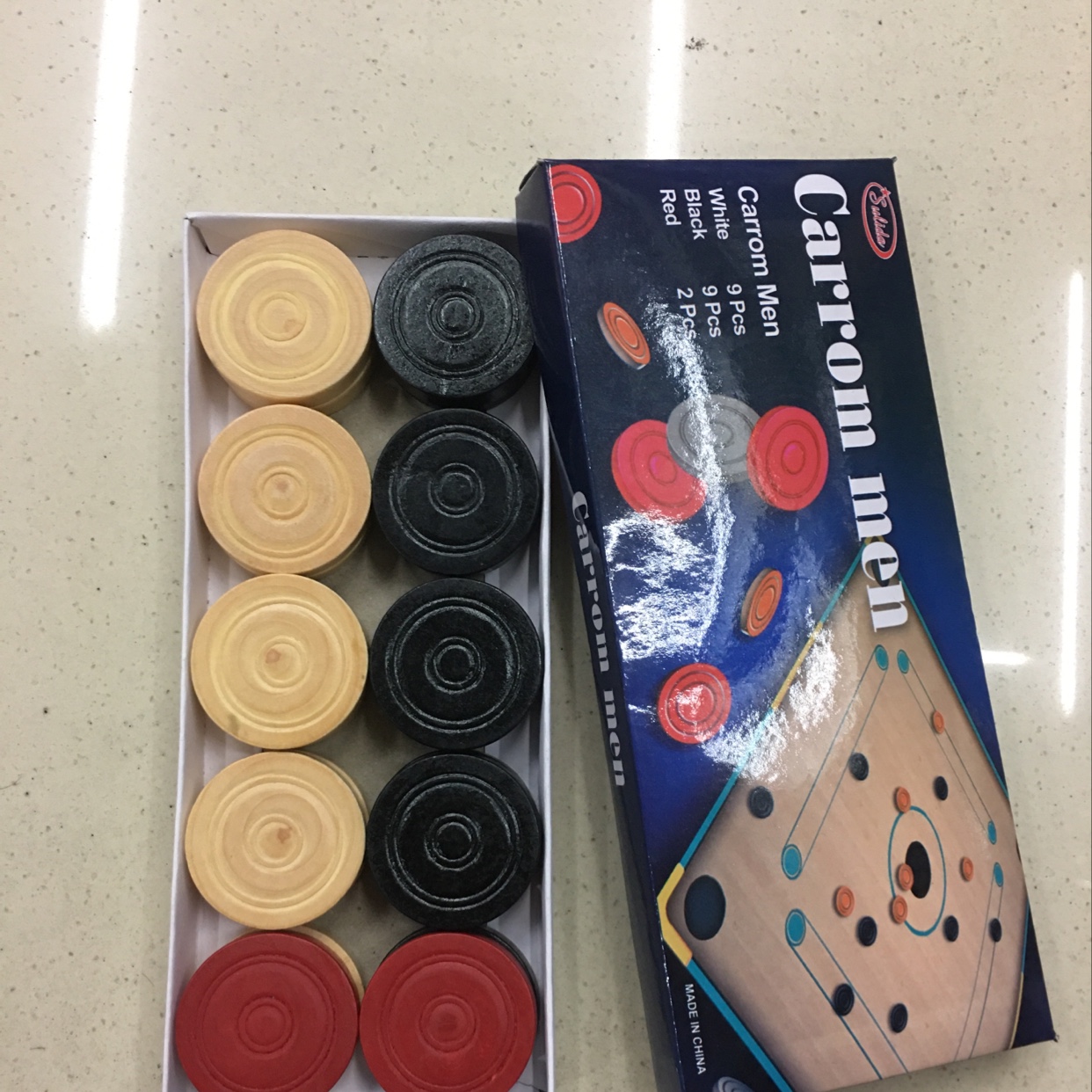 Carrom men