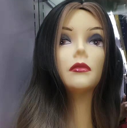 Long hair with synthetic fiber curls