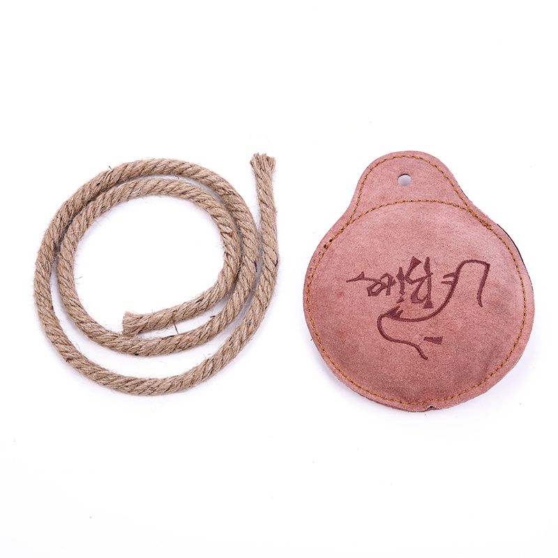 A pure cowhide toy frisbee for dogs that is resistant to biting