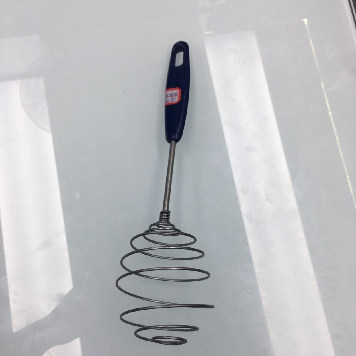 Plastic-handled egg beater