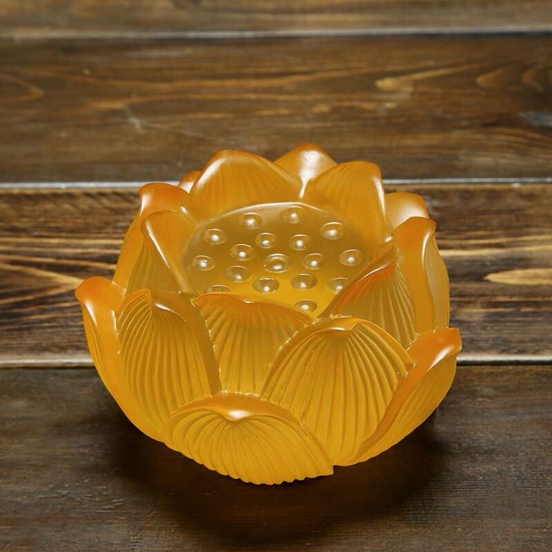A 10-inch LED lotus lamp, a glazed lotus lamp, is offered in front of the Buddha. It is a long-lasting lamp for the Buddha Application Scenario