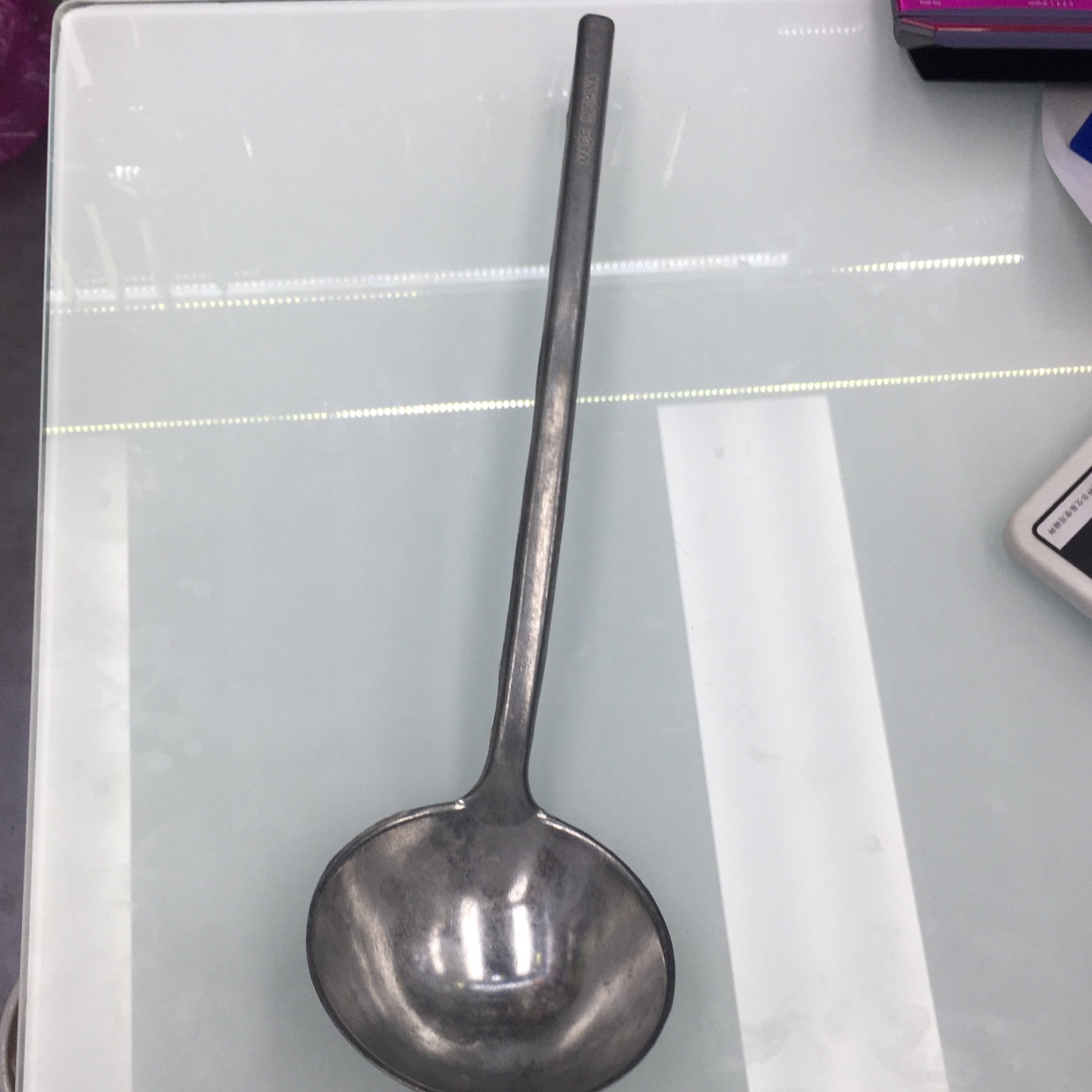 Aluminum spoon with hook