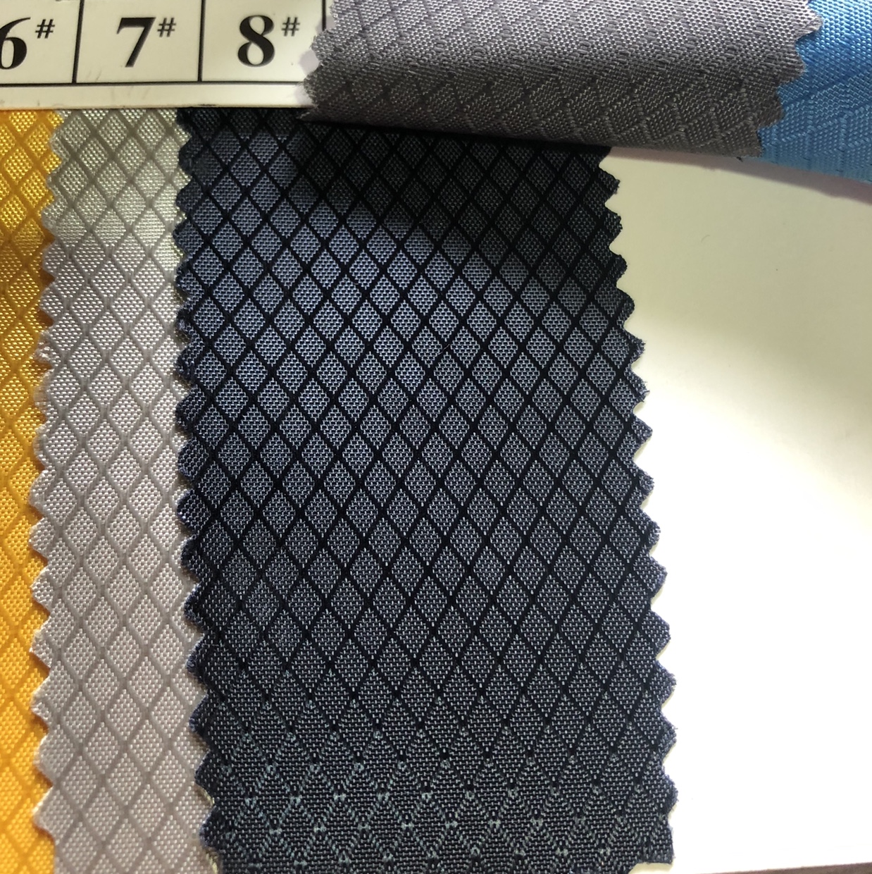 Glossy diamond-shaped checkered pu waterproof No. 8 navy blue polyester fabric, Oxford fabric, filament fabric 23