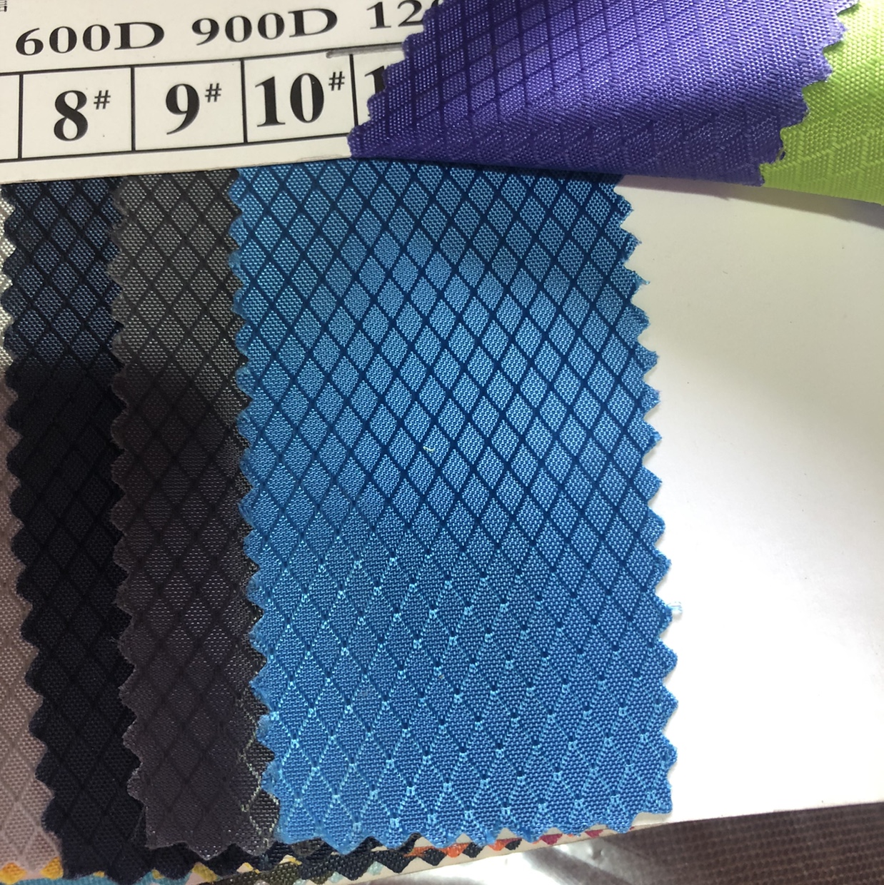 Glossy diamond-shaped checkered pu waterproof No. 10 lake blue polyester fabric, filament fabric, Oxford fabric 56946