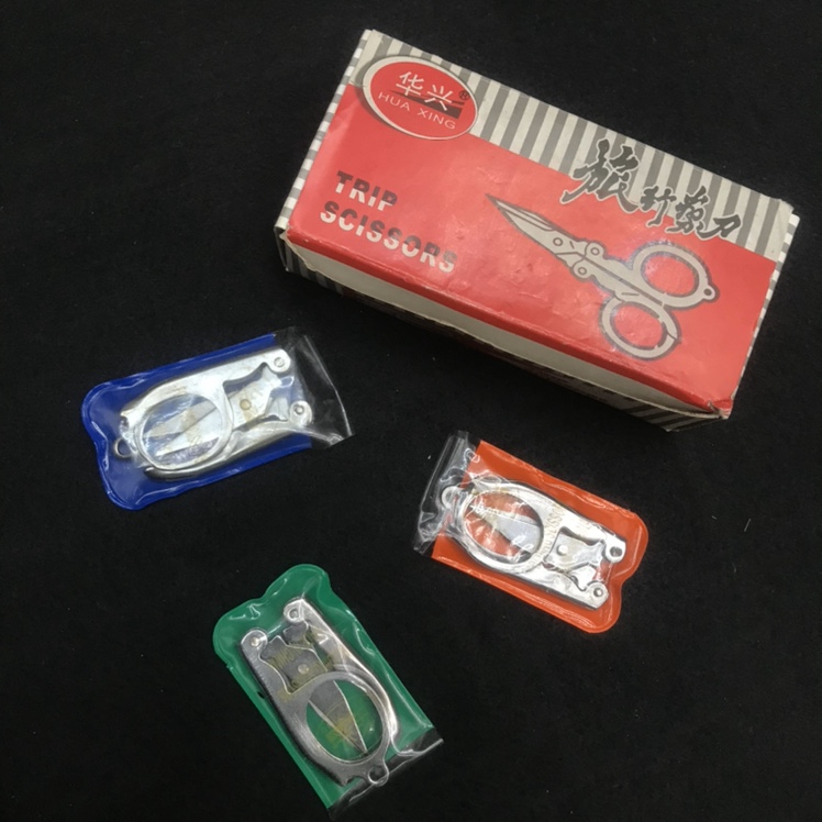Small travel scissors Folding scissors Huaxing small travel scissors portable scissors household scissors thumbnail