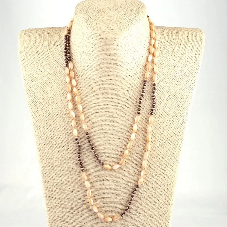 Shell beads tied in knots next 150 thumbnail