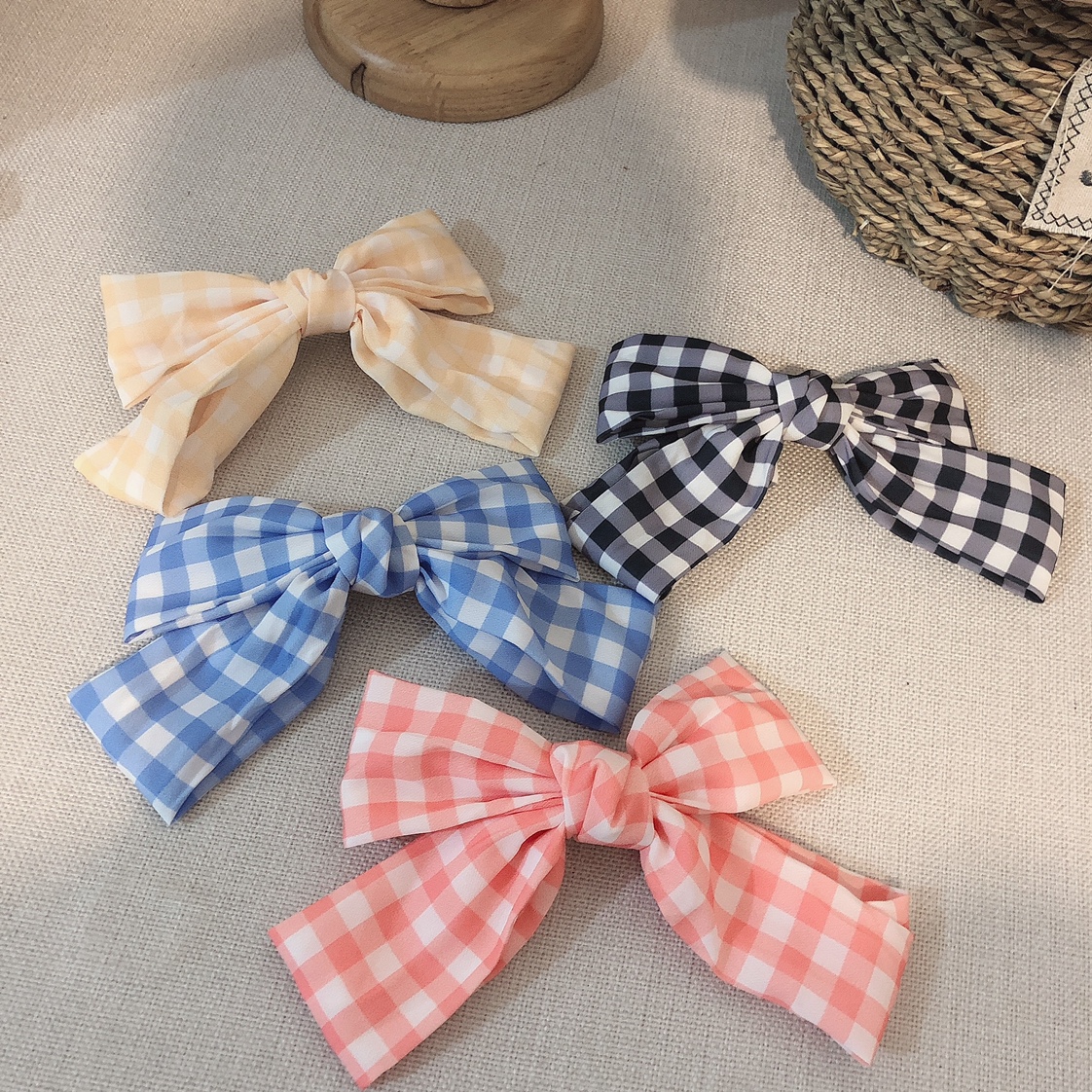 The checkered bow hair clip is a must-have and versatile accessory for piggy girls