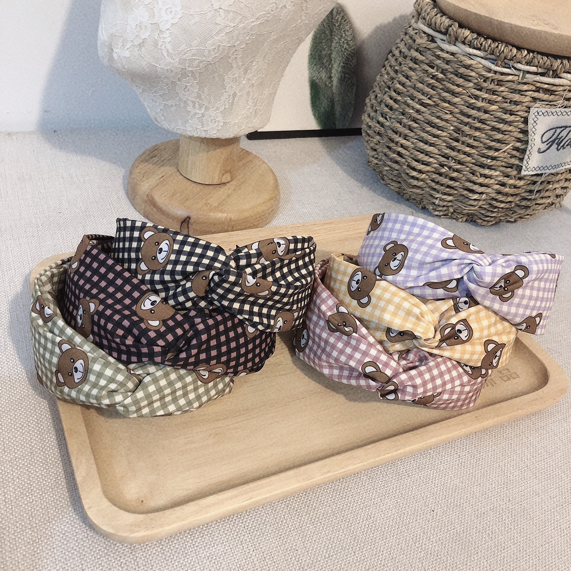 The checkered bear cross hairband is a must-have and versatile accessory for piggy girls