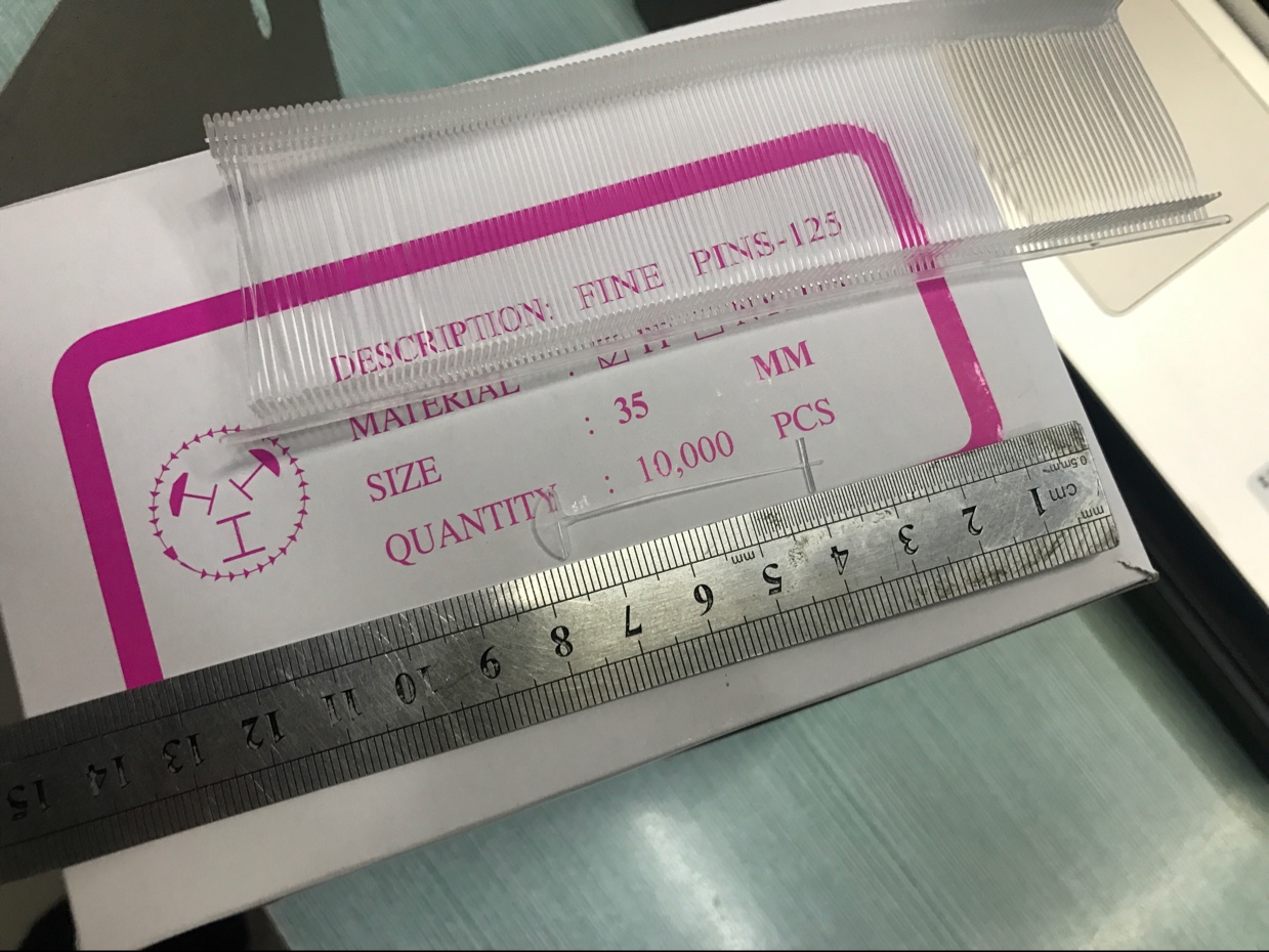 圆圈品牌35mm，125发细胶针。服装内衣、针织面料、袜子、鞋子、玩具、围巾、箱包、固定或吊挂商标