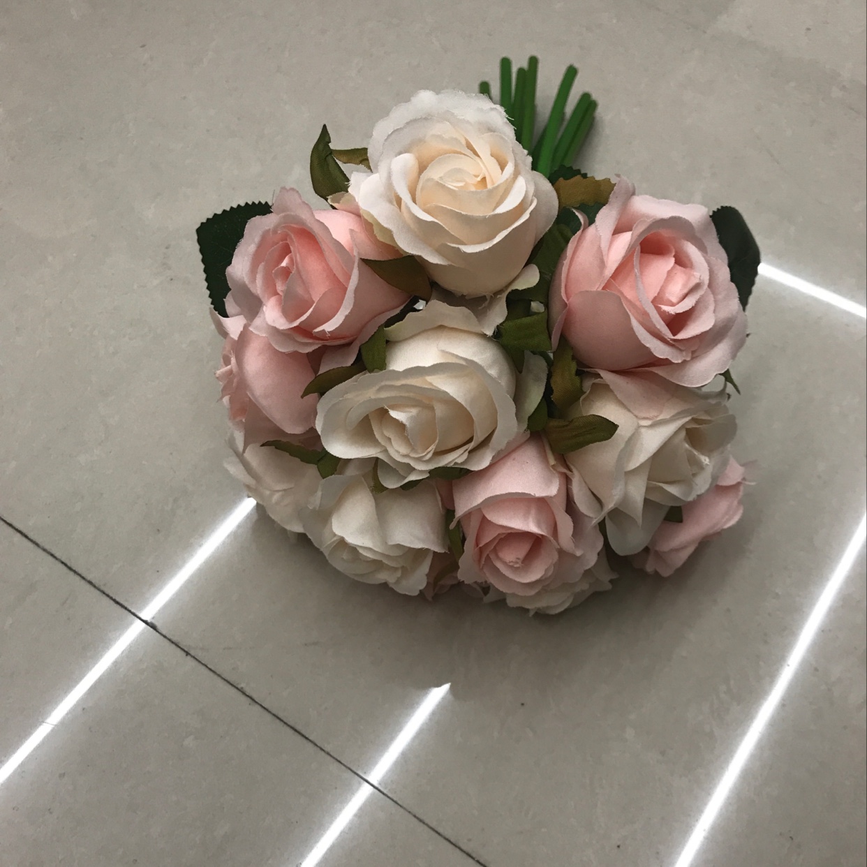 Twelve brides are holding bouquets