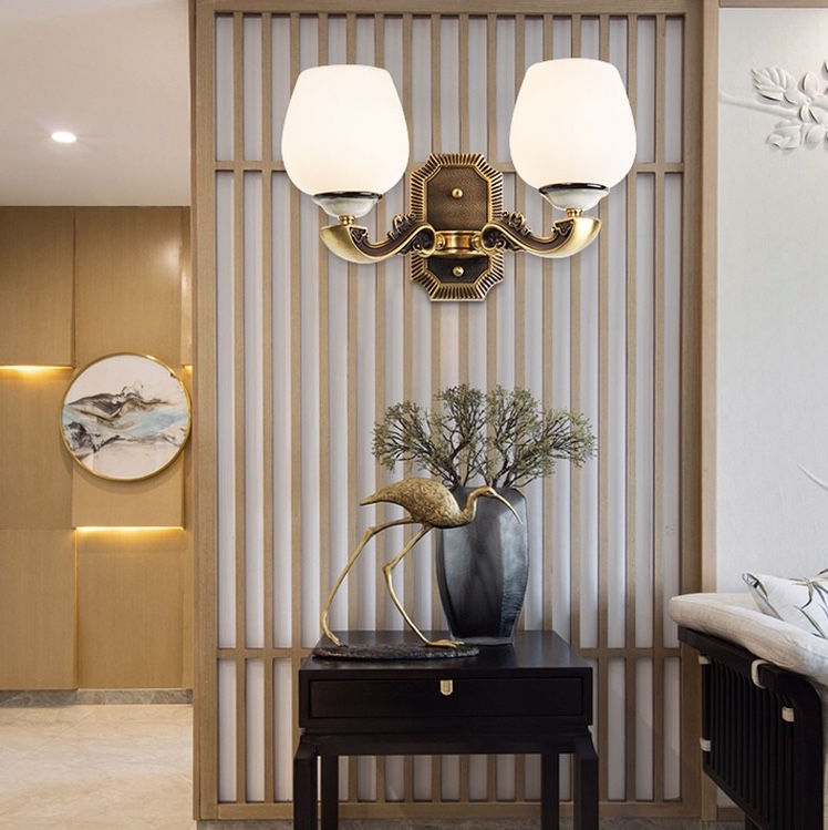 The new spring product of the national trend new Chinese-style Wood Forest is a double-head wall lamp made of zinc alloy, jade and glass with a lustrous and smooth texture