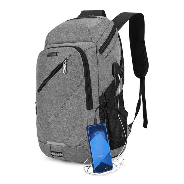 18寸笔记本电脑双肩背包书包休闲包商务包双孔数据线USB耳机线详情图1