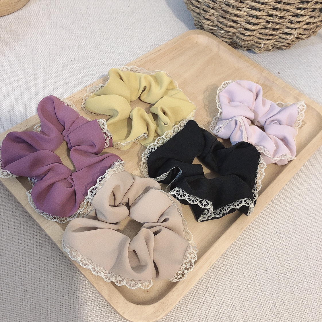 A solid color lace-trimmed cloth ring rubber band is a must-have and versatile accessory for piggy girls