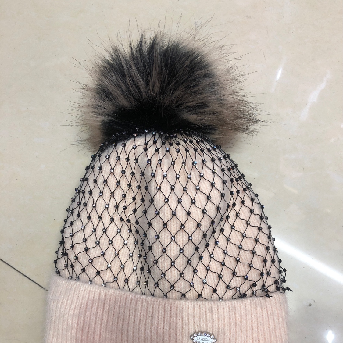 Knit lady with diamond winter hat thumbnail