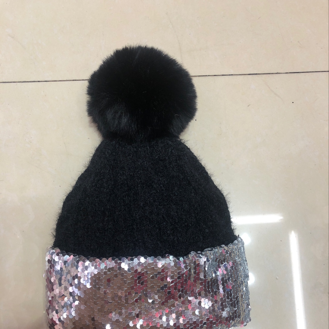 Lady with flash high knit winter hat thumbnail