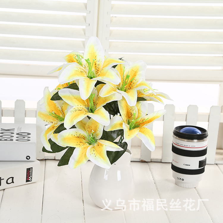 Yiwu Fumin Silk Flower Factory wholesals 10-head artificial lilies, artificial silk flowers, wedding decoration flowers, and artificial flowers for living room decoration undefined