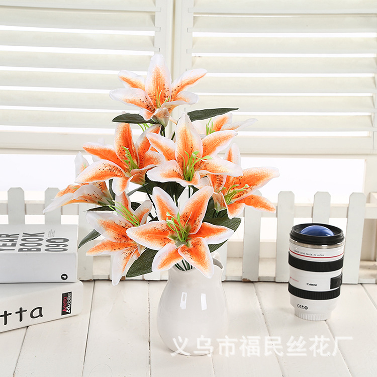 Yiwu Fumin Silk Flower Factory wholesals 10-head artificial lilies, artificial silk flowers, wedding decoration flowers, and artificial flowers for living room decoration undefined
