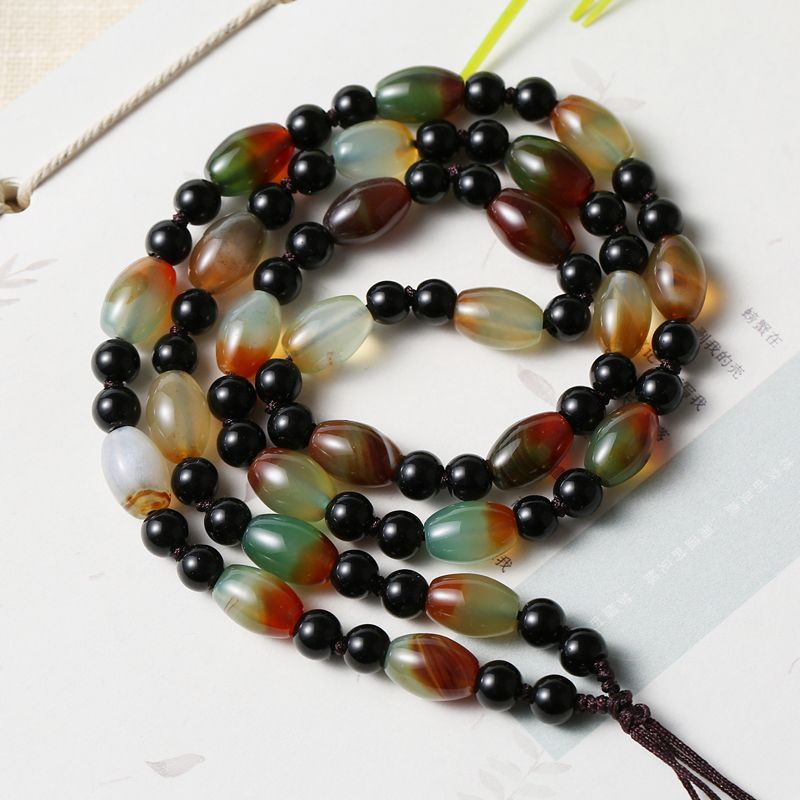 Hand-woven necklace string with peacock color agate