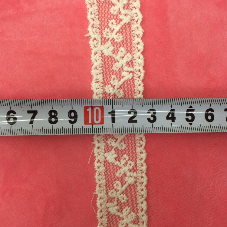 Embroidery on mesh fabric and cotton thread Specification image