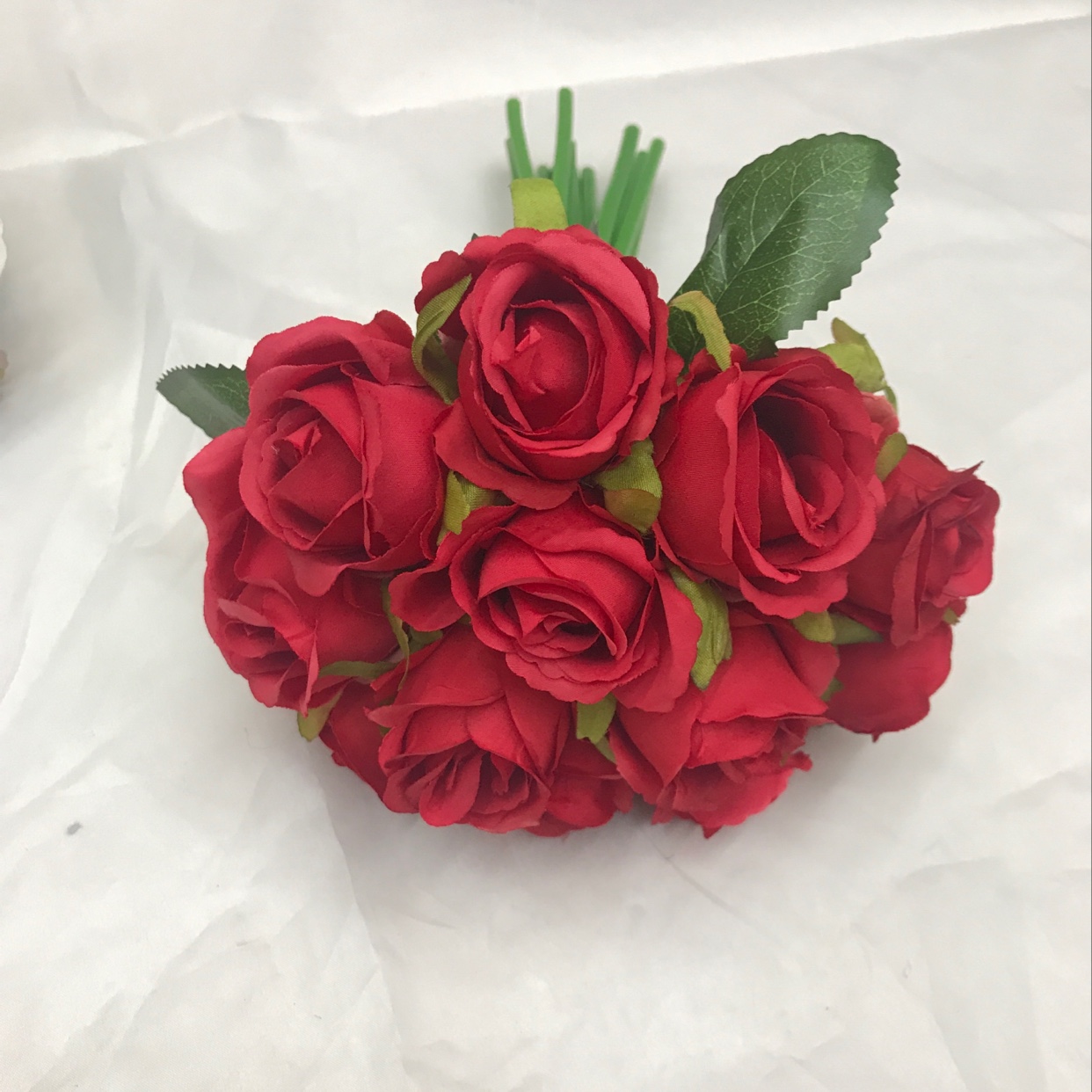 Twelve brides are holding bouquets undefined