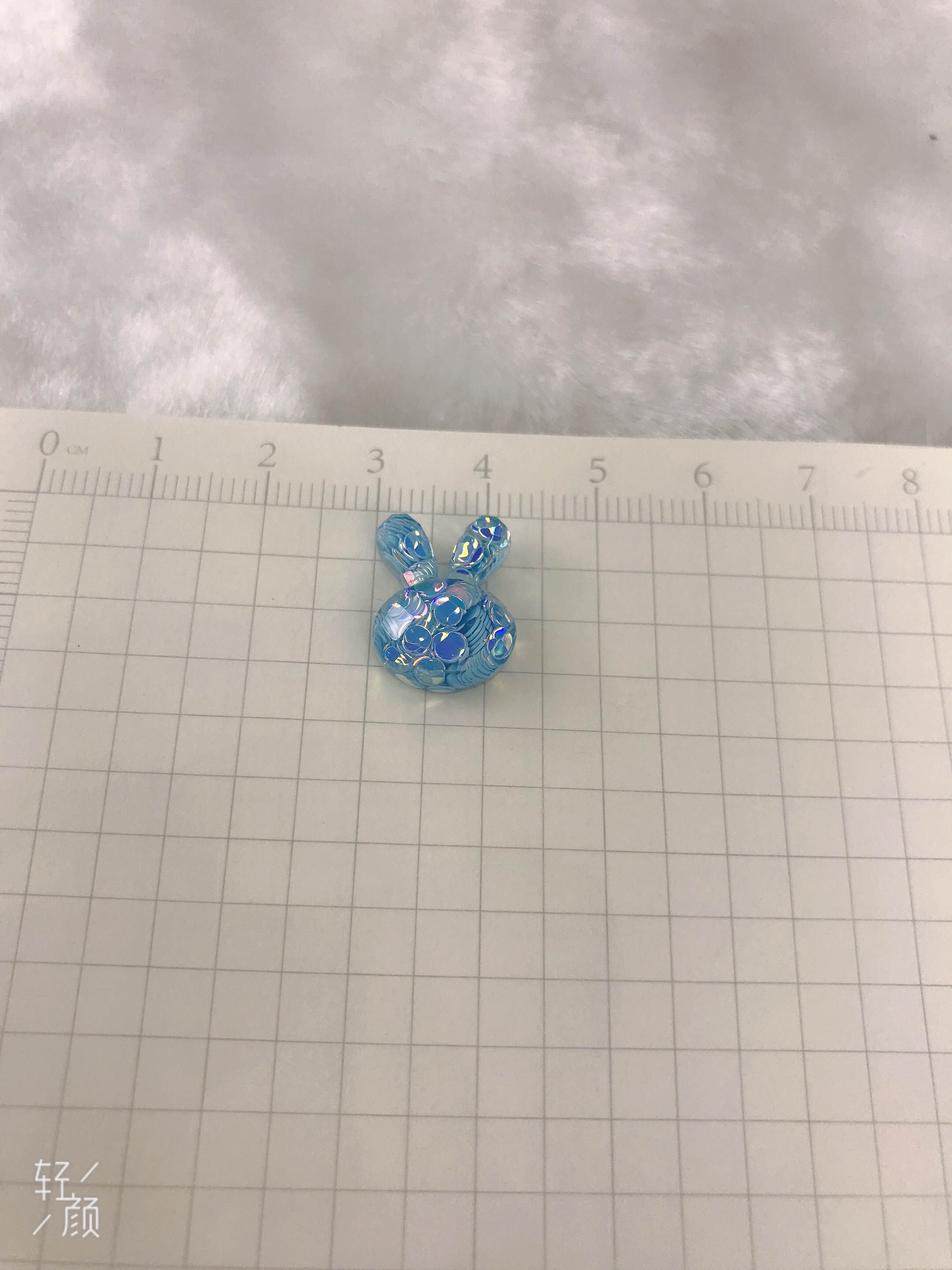 ab glue epoxy resin glass cut surface AB colored sequins rabbit head details Picture