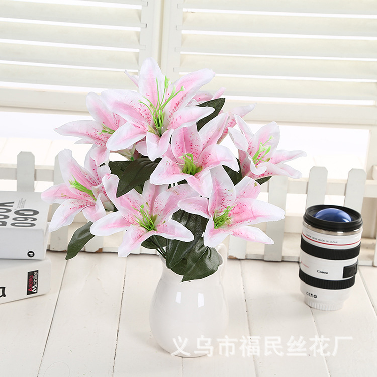 Yiwu Fumin Silk Flower Factory wholesals 10-head artificial lilies, artificial silk flowers, wedding decoration flowers, and artificial flowers for living room decoration undefined