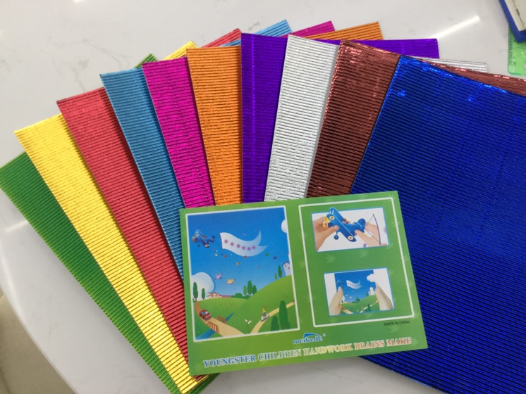 Metallic corrugated paper