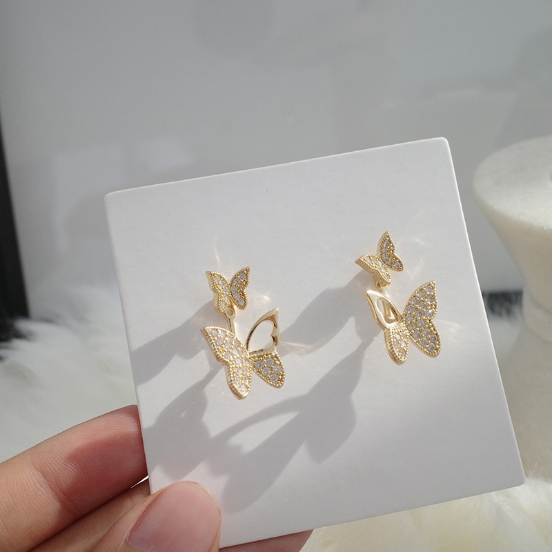 A pair of 925 silver stud earrings with a gentle and ethereal charm, exquisitely small and diamond-encrusted butterfly-shaped fashionable ins earrings for women