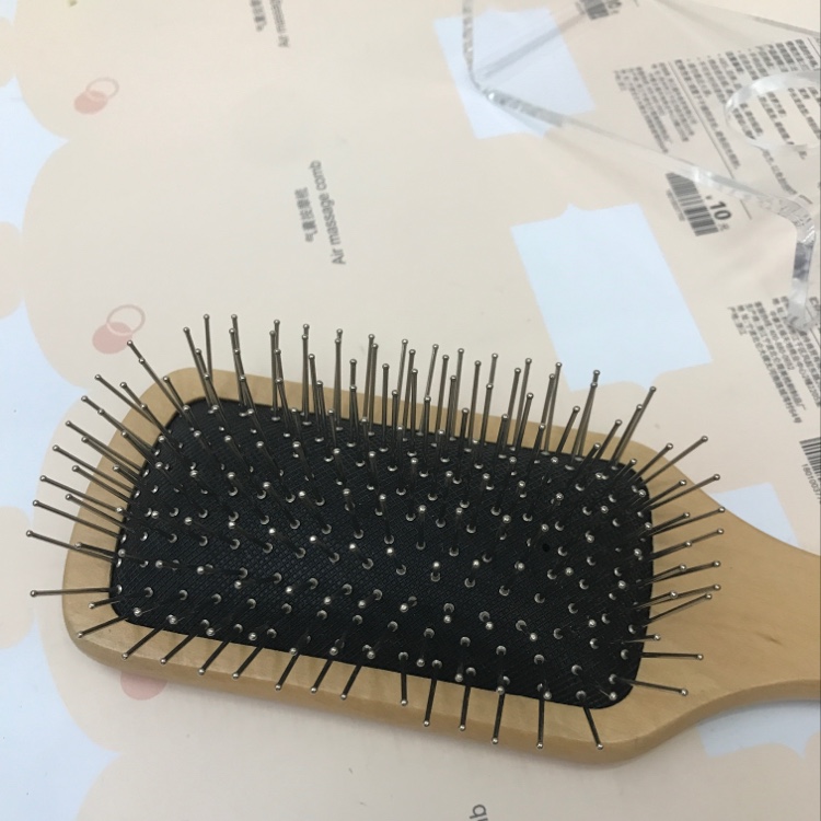 Anti-static steel needle wig comb in natural wood color details Picture
