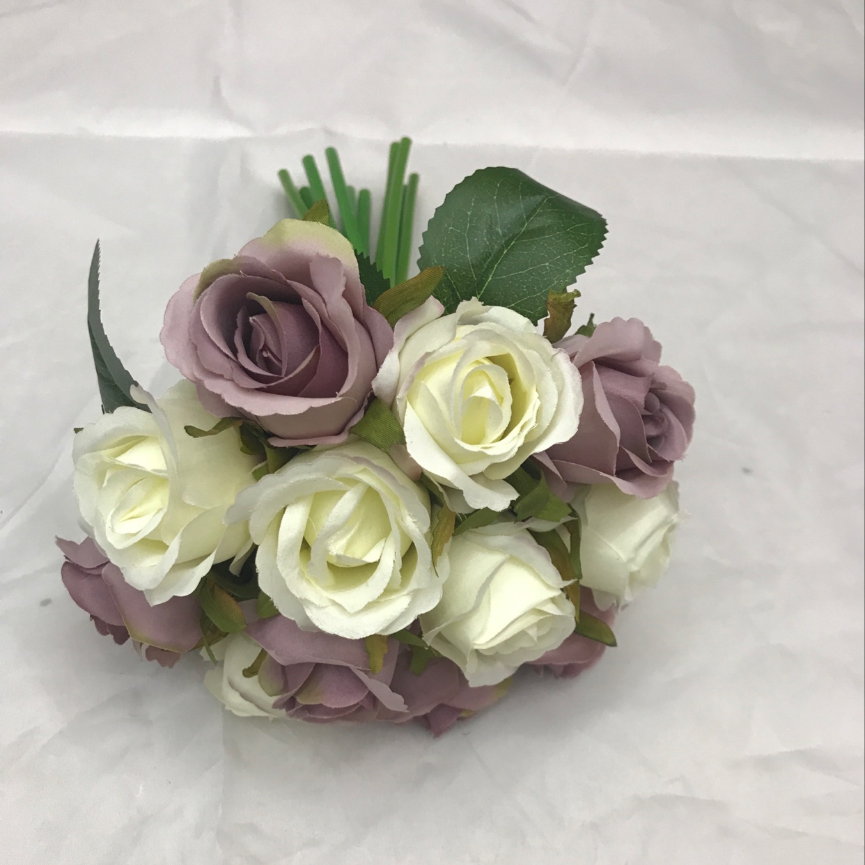 Twelve brides are holding bouquets undefined