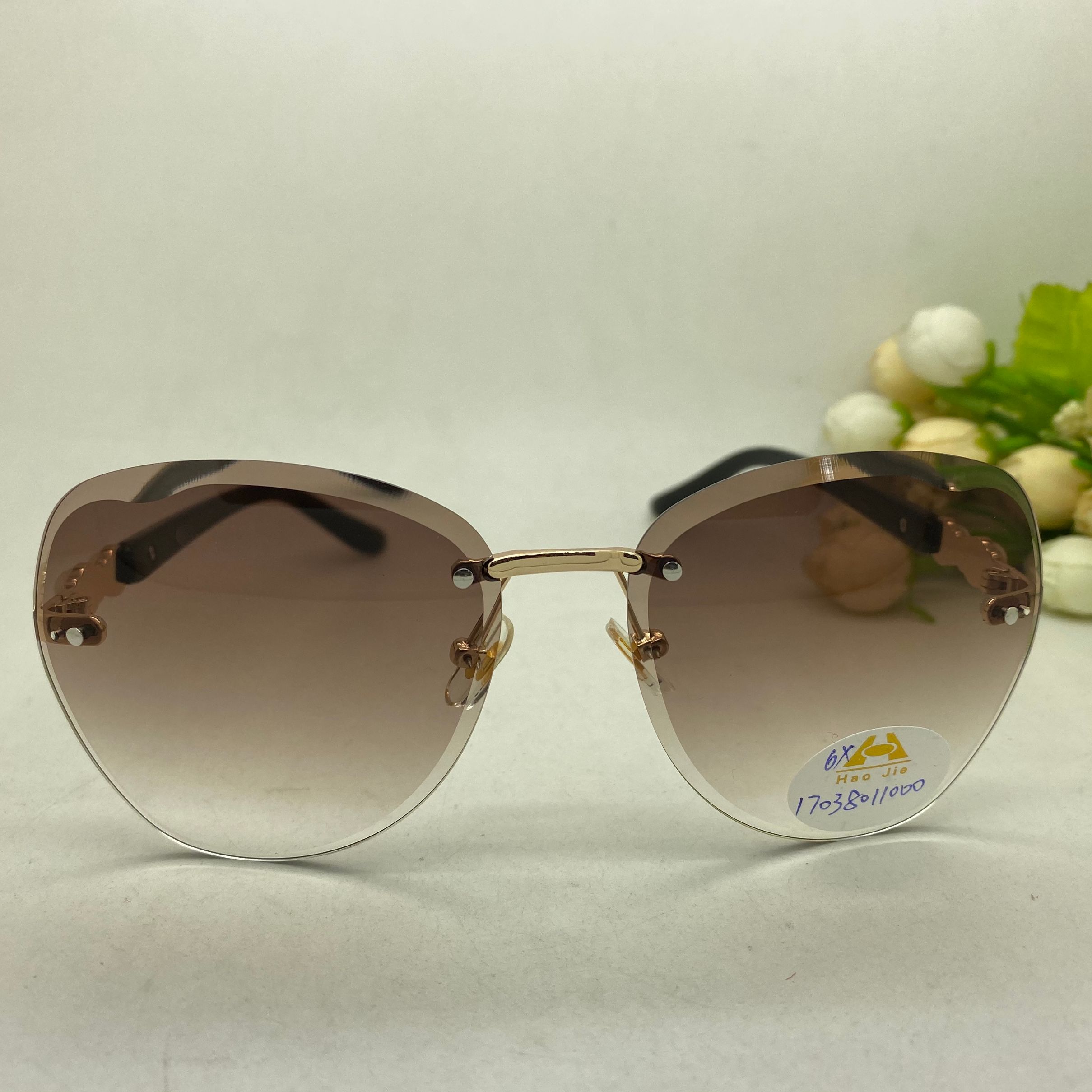Yiwu Selection fashion metal rimless sunglasses women 2020 new 17038 thumbnail