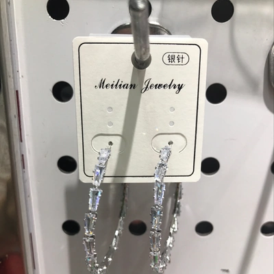 A single set of atmospheric zircon earrings thumbnail