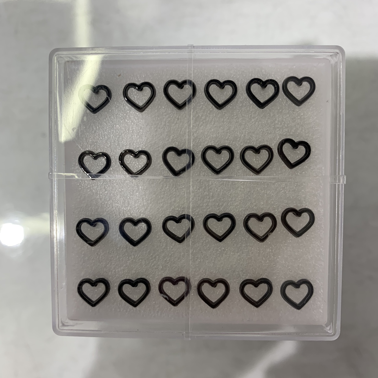 Black heart hollow stud earrings thumbnail
