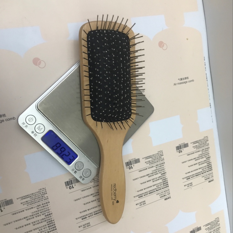Anti-static steel needle wig comb in natural wood color Application Scenario