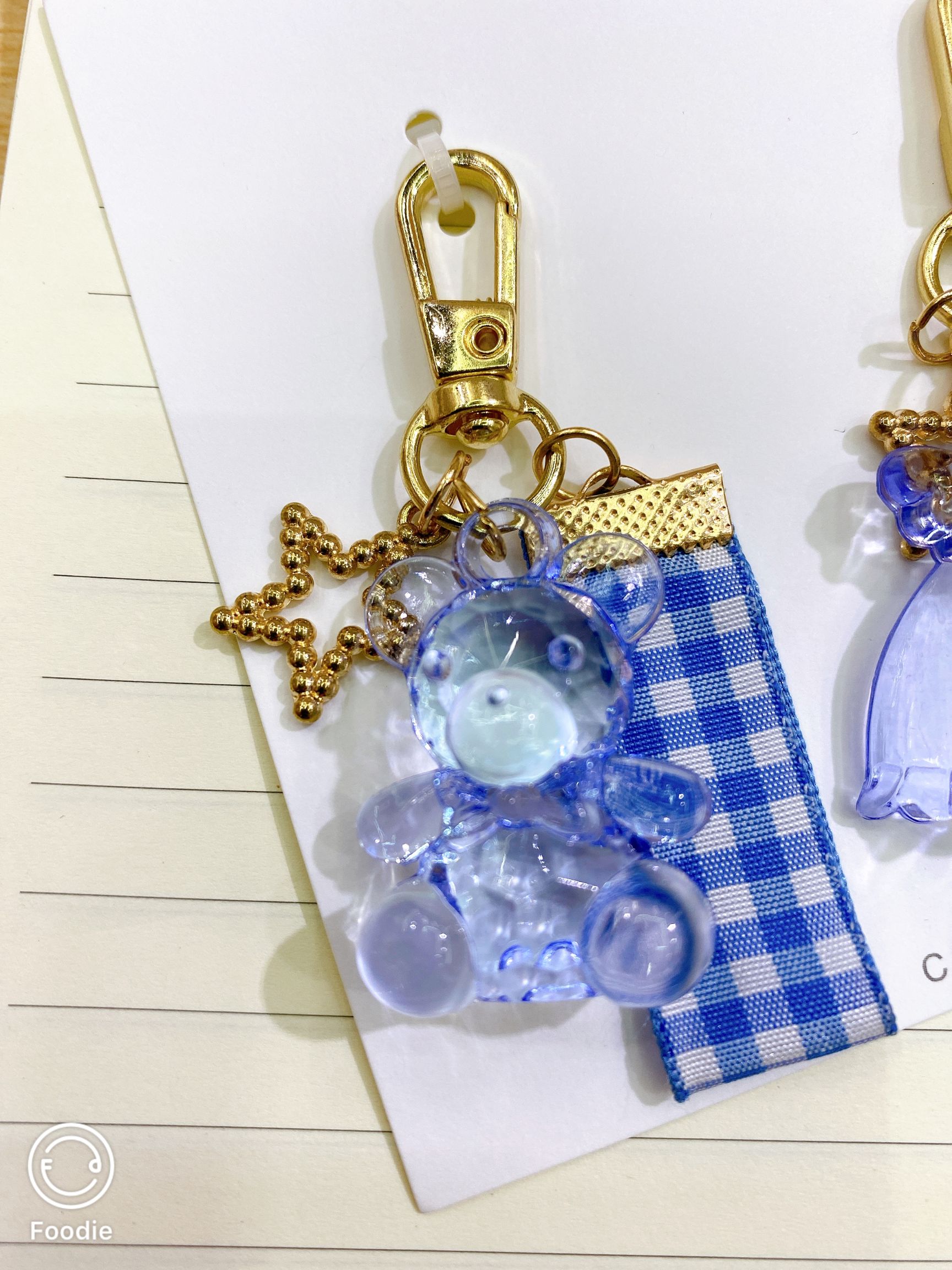 Chen Ming ornaments with a blue tie on a bear key chain