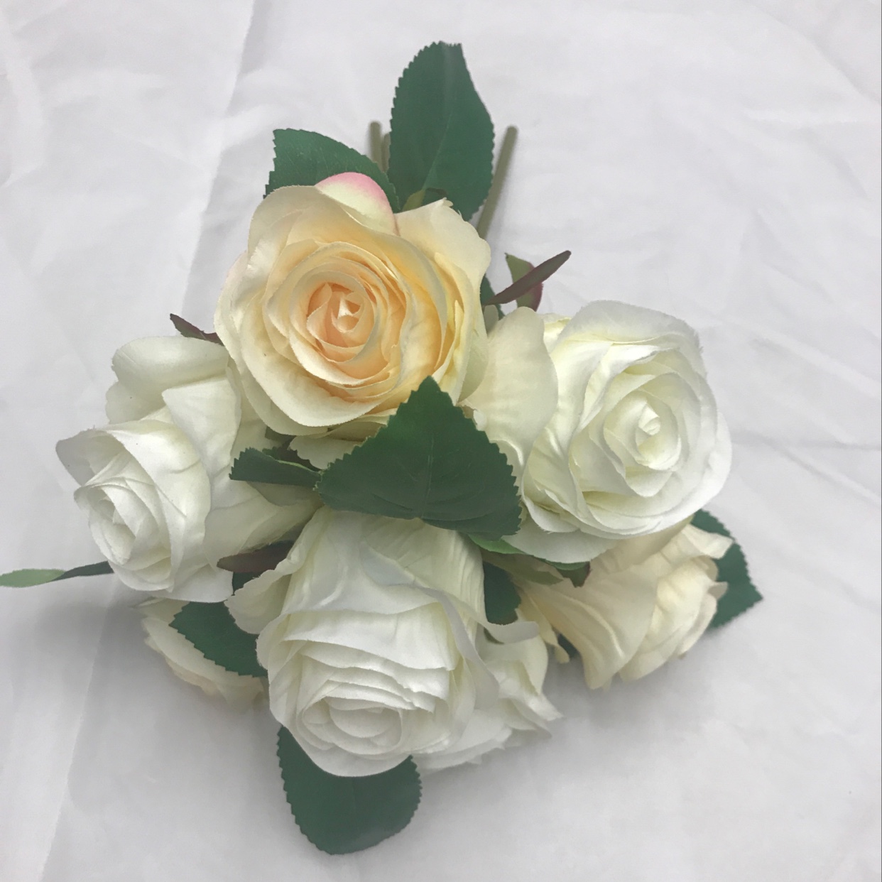 A bouquet of seven lovers' roses