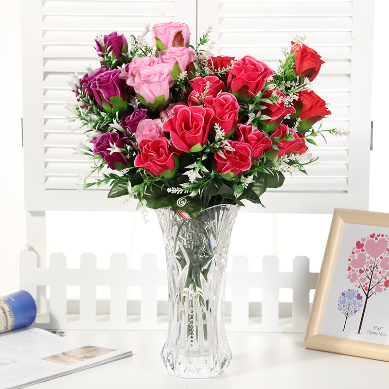 Yiwu Fumin Silk Flower Factory wholesals 12 artificial rose silk flowers, wedding decoration flowers and living room decoration flowers