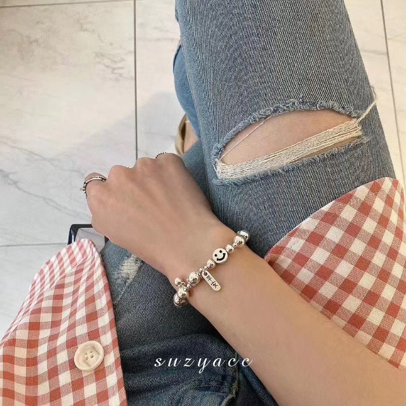 A pure silver bracelet with a smiling face Specification image