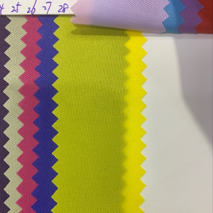 厂家直销热销新款牛津布210D皮革大量现货高中低档箱包沙发鞋材面料28号色产品图
