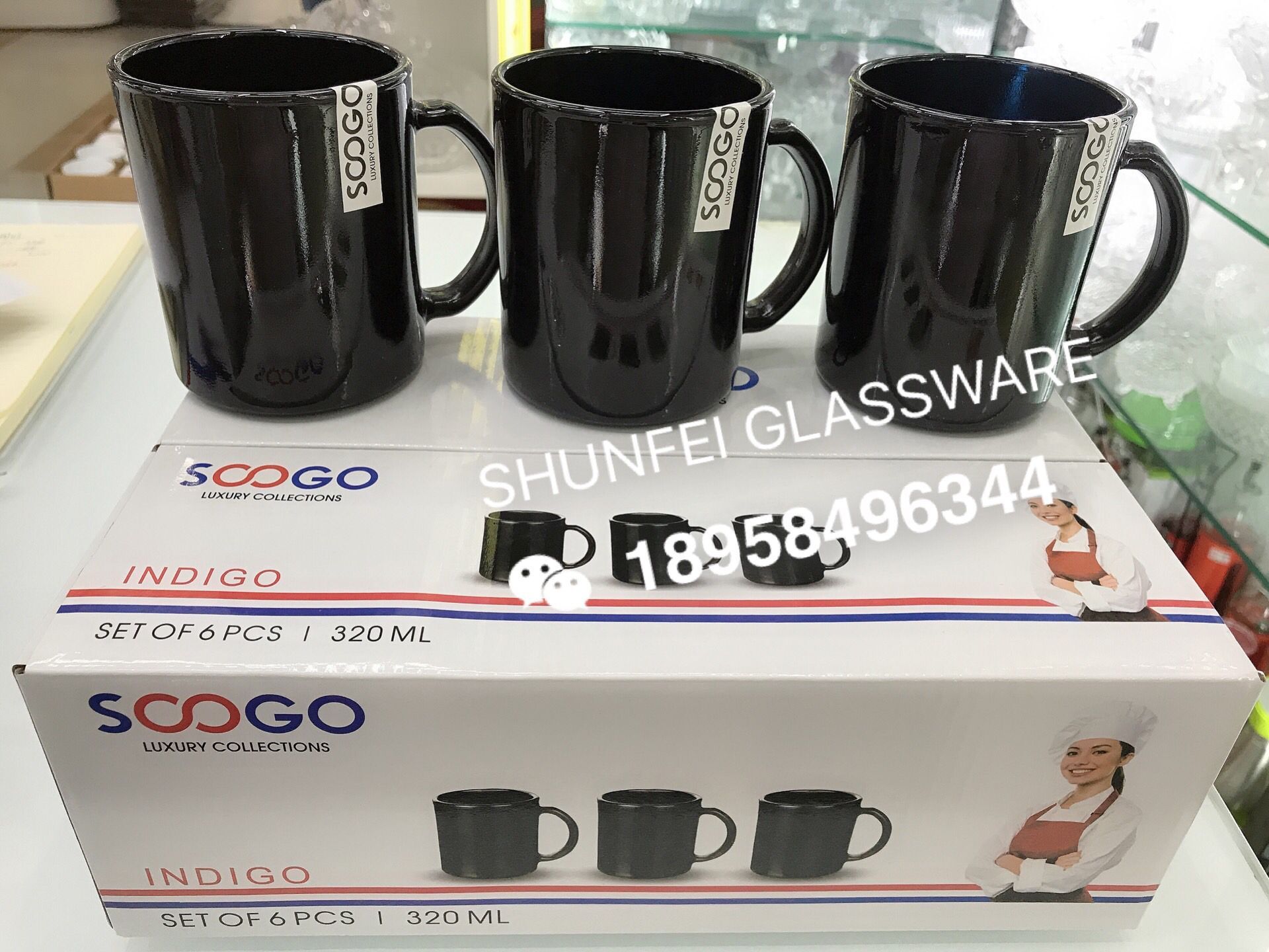 Heat - tempered black glass mug thumbnail