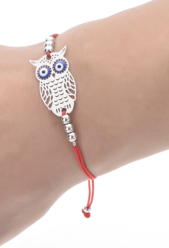 不锈钢配饰蓝眼睛手工编织蜡绳手链产品图