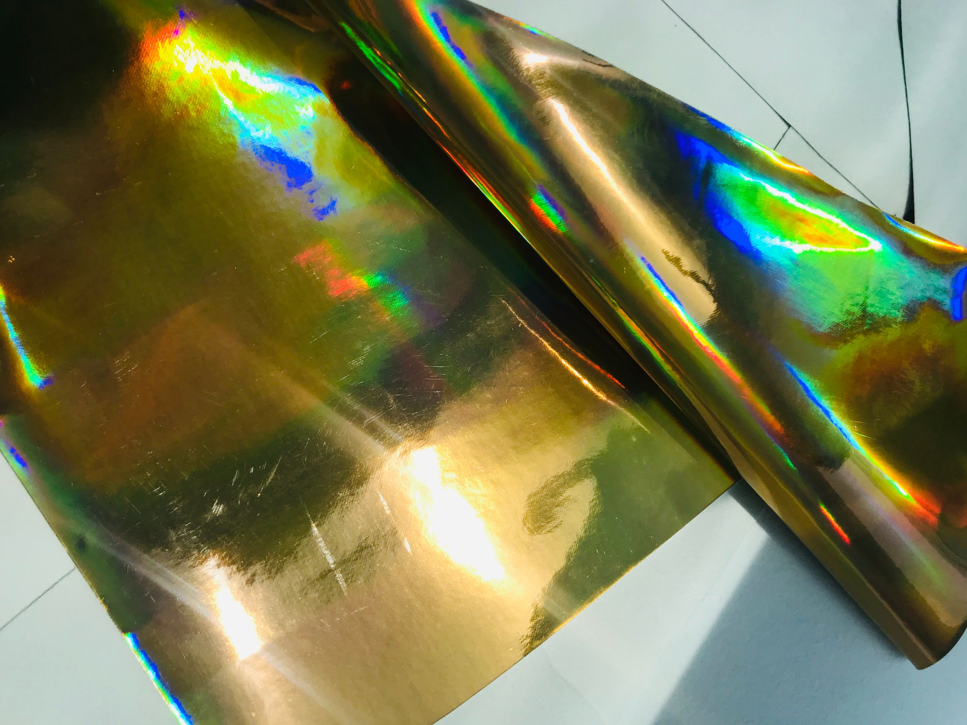 现货供应TPU镭射革镜面合成革，用于饰品，箱包，鞋材，包装等详情图2