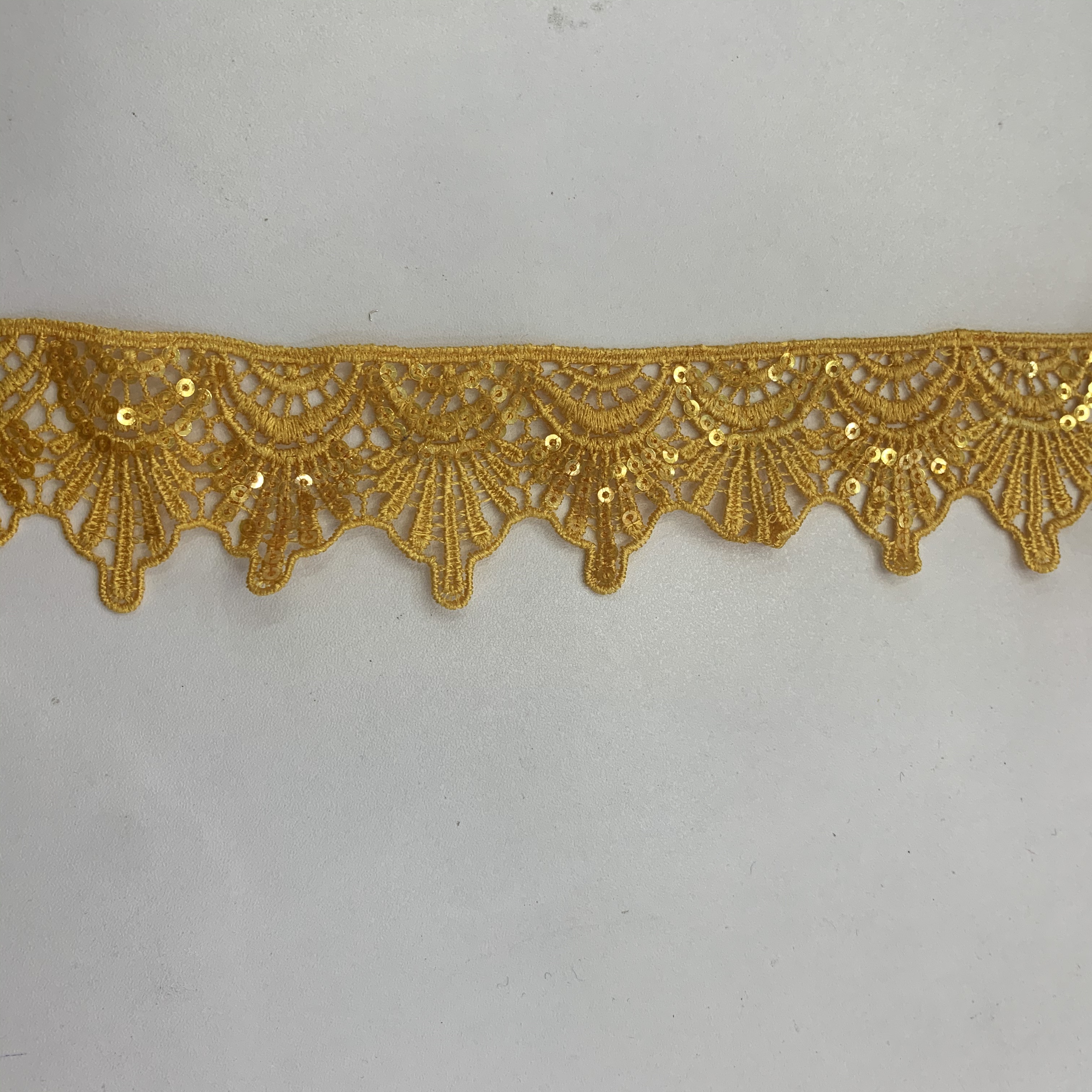 The clothing is decorated with sequined lace and embroidered lace Specification image